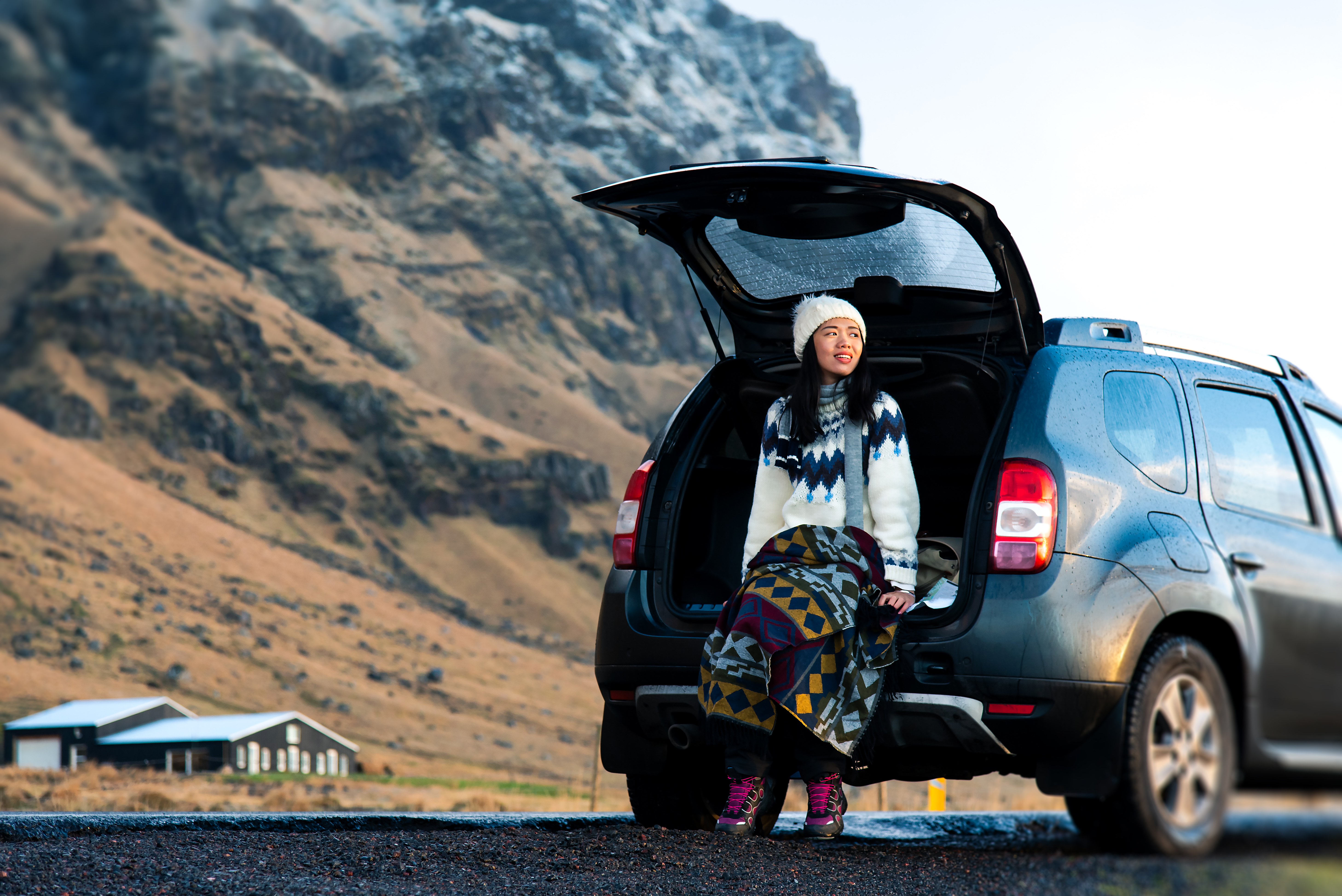 Iceland female traveller by car